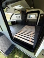 kampera-bushcamp-cargo-bushcamp-cargo-przestrzen-pod-lozkiem-orig.webp
